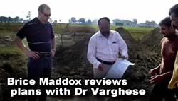 Dr Varghses reviews plans with Brice Maddox